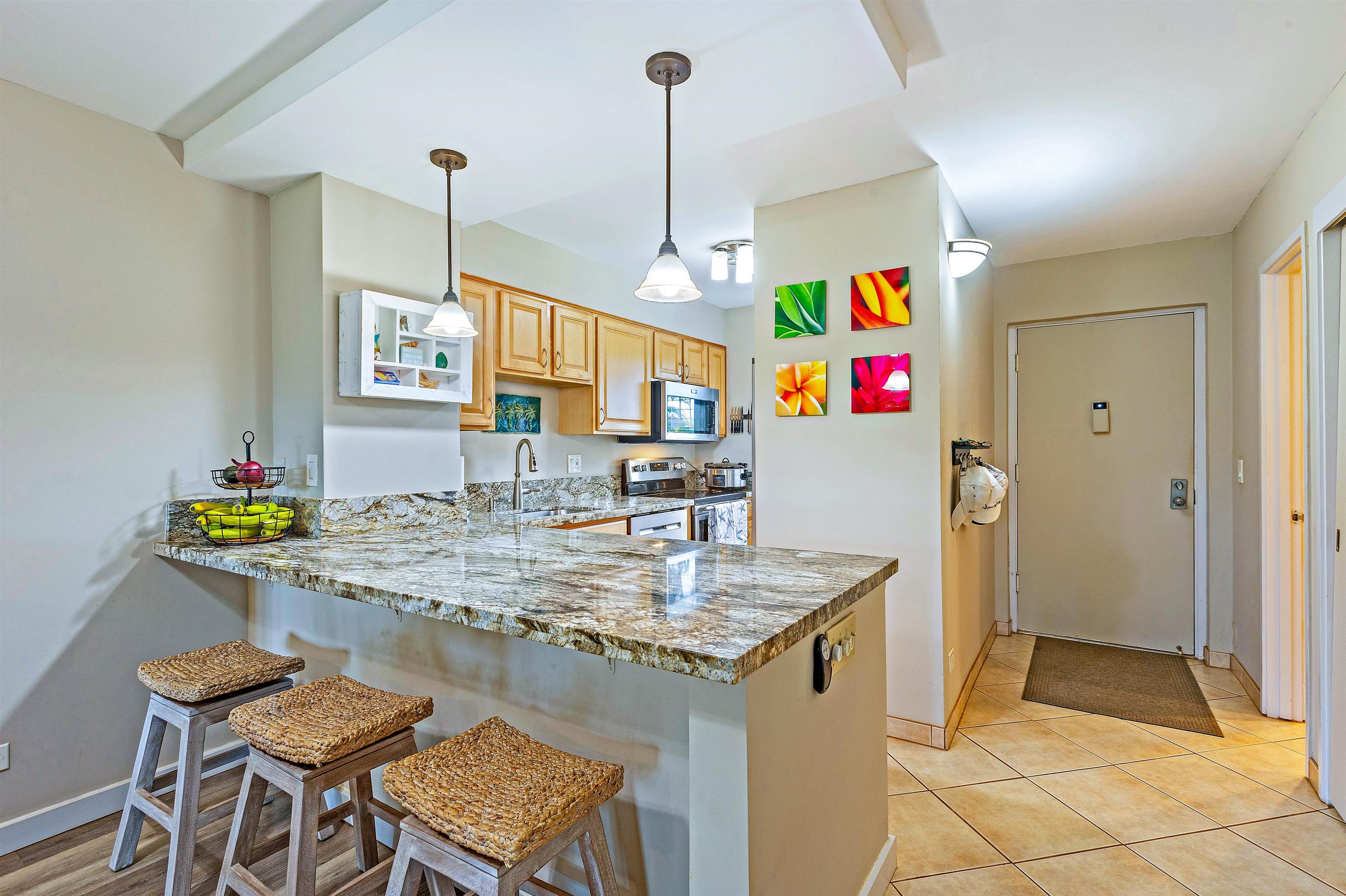3788 Lower Honoapiilani Road, Unit A110 Lahaina, HI 96761 - Photo 5 of 35 a view of kitchen island with cabinets