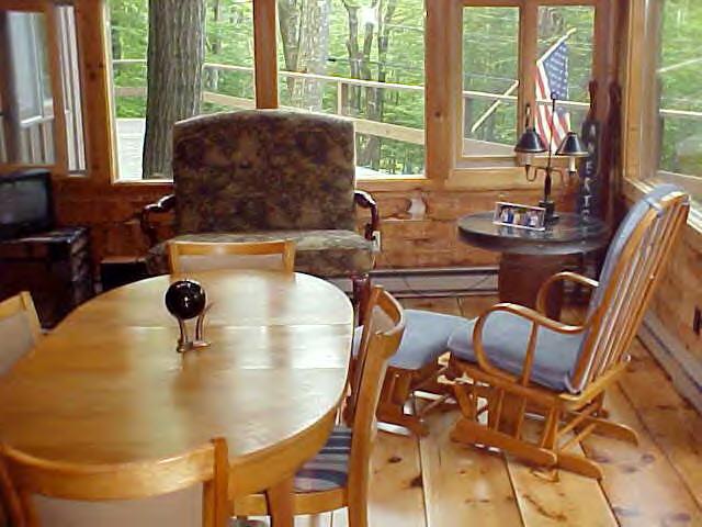 1060 George Carter Road Becket, MA 01223 - Photo 4 of 15 a living room with dining table and a large window