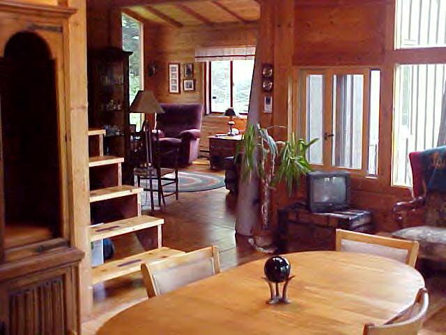 1060 George Carter Road Becket, MA 01223 - Photo 5 of 15 a living room with furniture large window and wooden floor