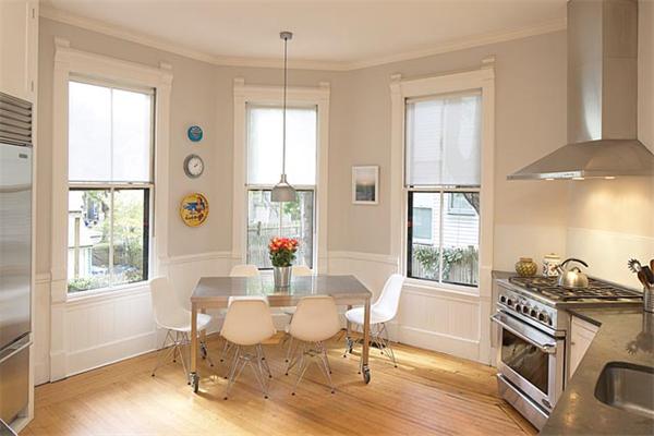 203 Aspinwall Avenue Brookline, MA 02446 - Photo 4 of 9 a view of a dining room with furniture window and outside view