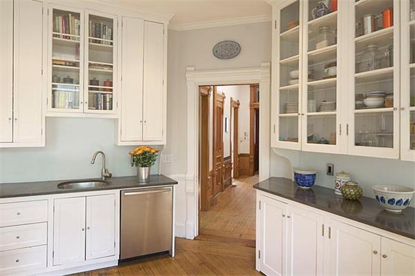 203 Aspinwall Avenue Brookline, MA 02446 - Photo 5 of 9 a kitchen with cabinets appliances and a sink