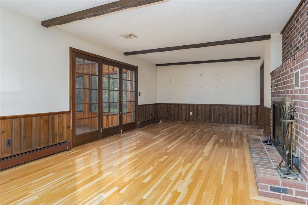 21 Saddle Lane Groton, MA 01450 - Photo 11 of 31 a view of wooden floor