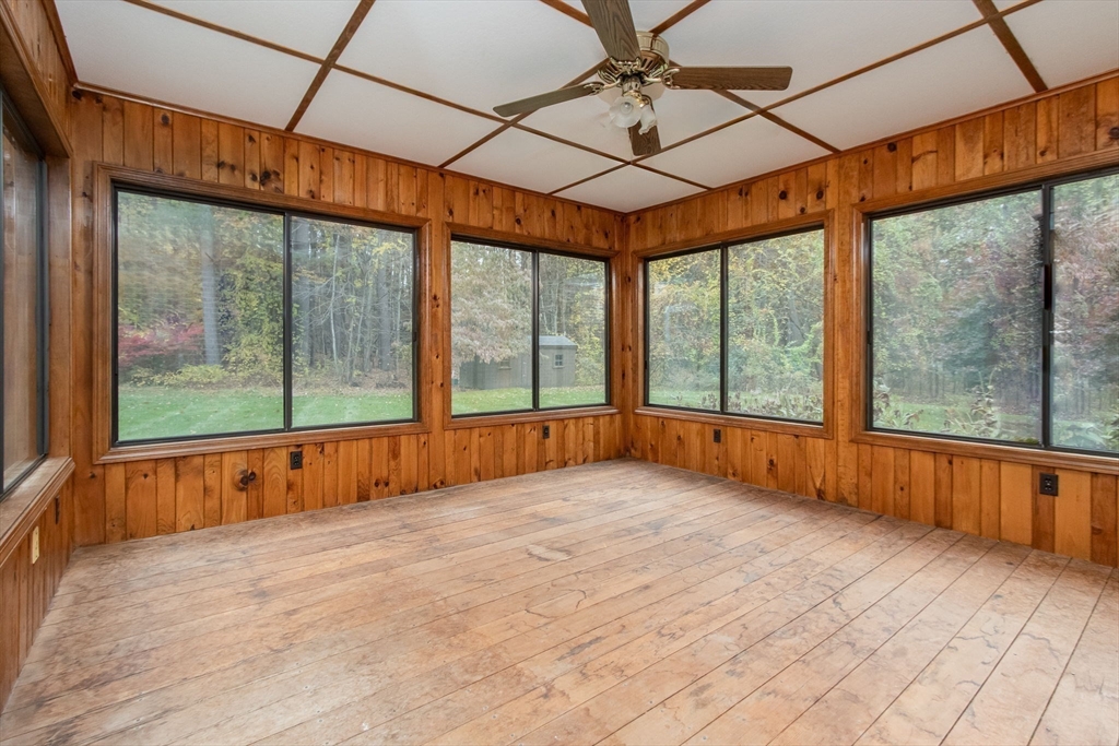21 Saddle Lane Groton, MA 01450 - Photo 23 of 31 a view of an empty room with a large window
