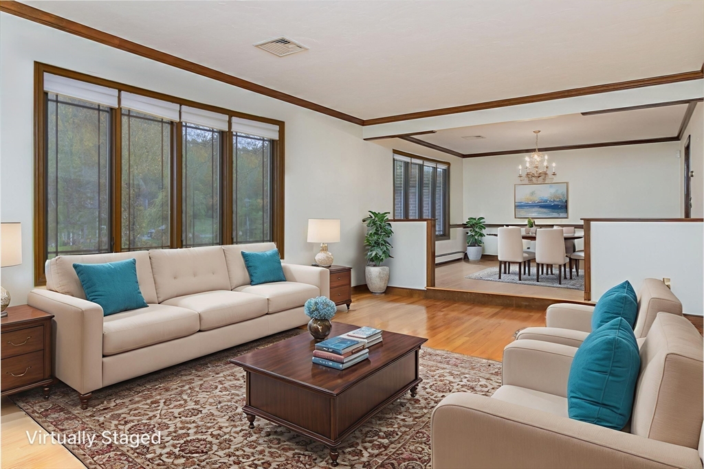 21 Saddle Lane Groton, MA 01450 - Photo 3 of 31 a living room with furniture and a large window