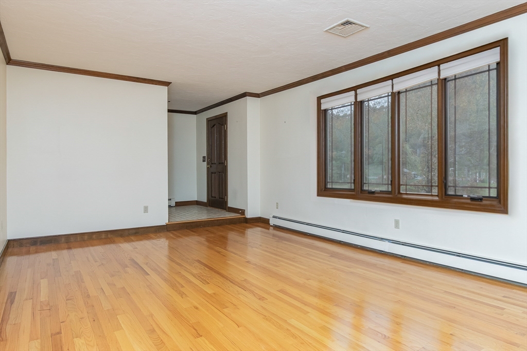 21 Saddle Lane Groton, MA 01450 - Photo 5 of 31 a view of an empty room