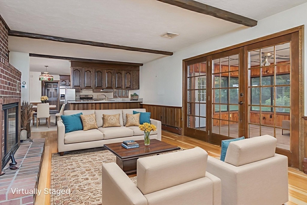21 Saddle Lane Groton, MA 01450 - Photo 10 of 31 a living room with furniture and a large window