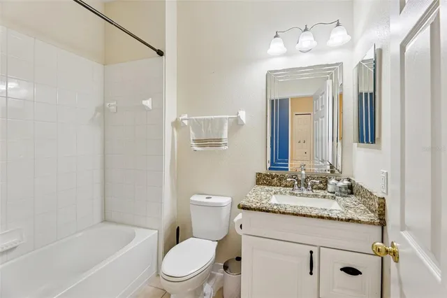 a bed room with furniture and a window