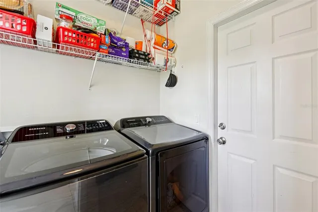 a picture of a bathroom with a shower