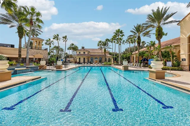 a view of a yard with swimming pool