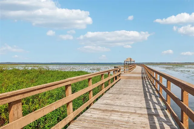 a view of an outdoor space and tennis court