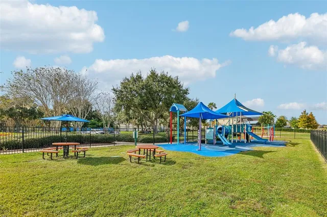 a view of a park with swings