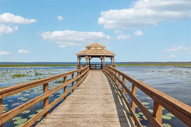 a view of wooden floor with a ocean view