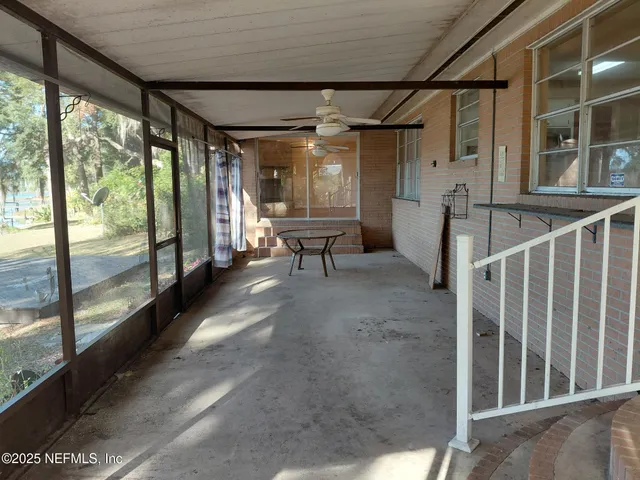 a kitchen with appliances cabinets and a window