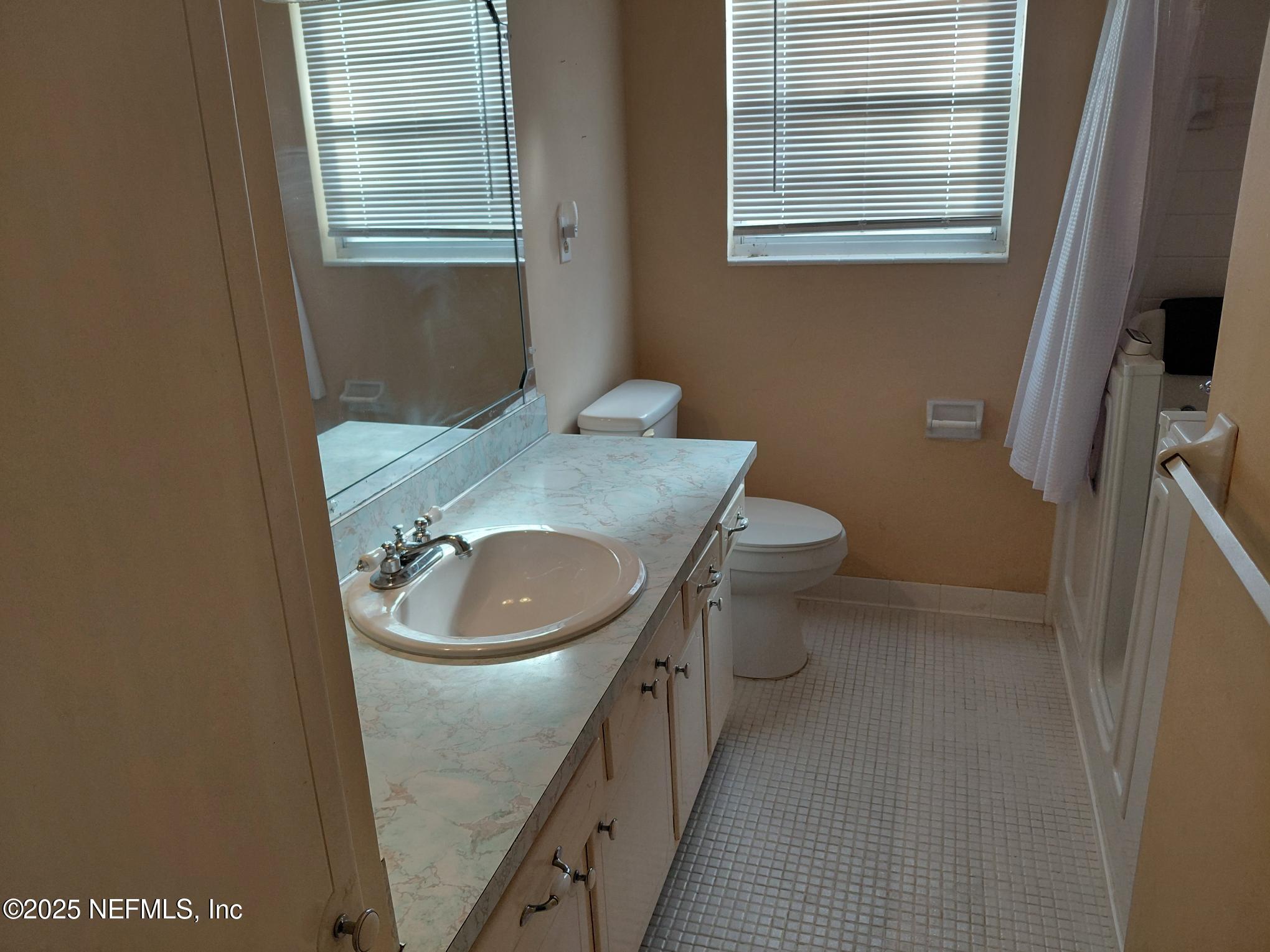 113 Lake Como Point Road Pomona Park, FL 32181 - Photo 30 of 36 a bathroom with a sink and toilet