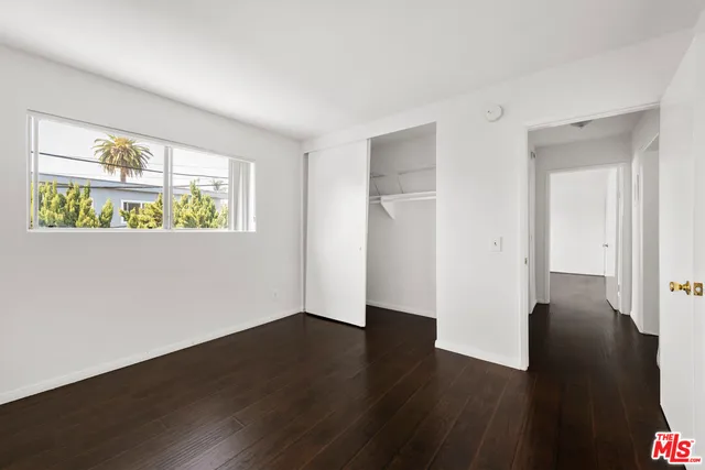 a view of livingroom with furniture and windows