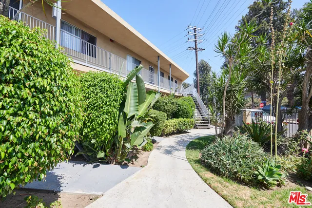 a view of a potted plants on a balcony