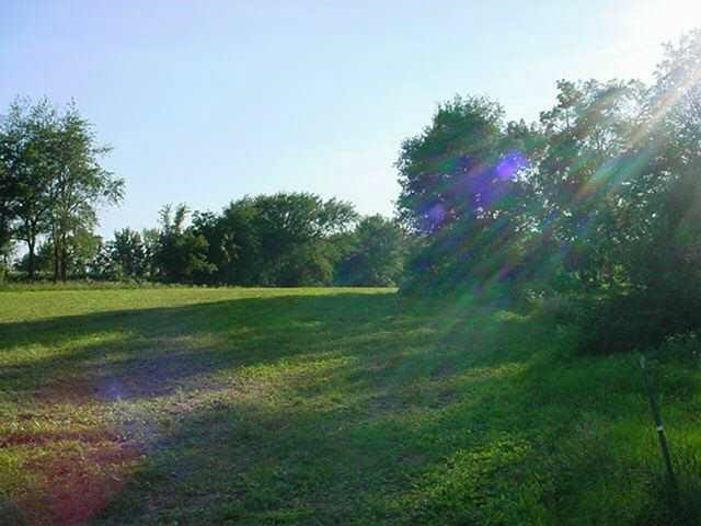 22985 Blue Goose Road Chadwick, IL 61014 - Photo 3 of 3 a view of a golf course with a lake