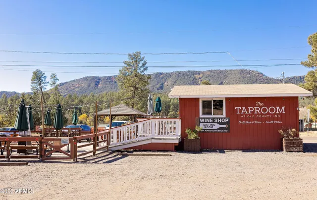 a view of a street with sitting area