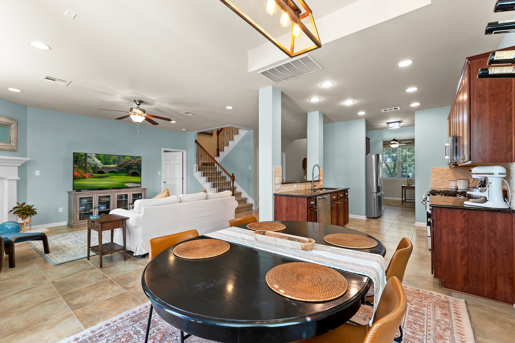 2813 Granite Hill Cove Leander, TX 78641 - Photo 15 of 39 Dining space featuring a ceiling fan & recessed lighting. Previously staged with furniture.