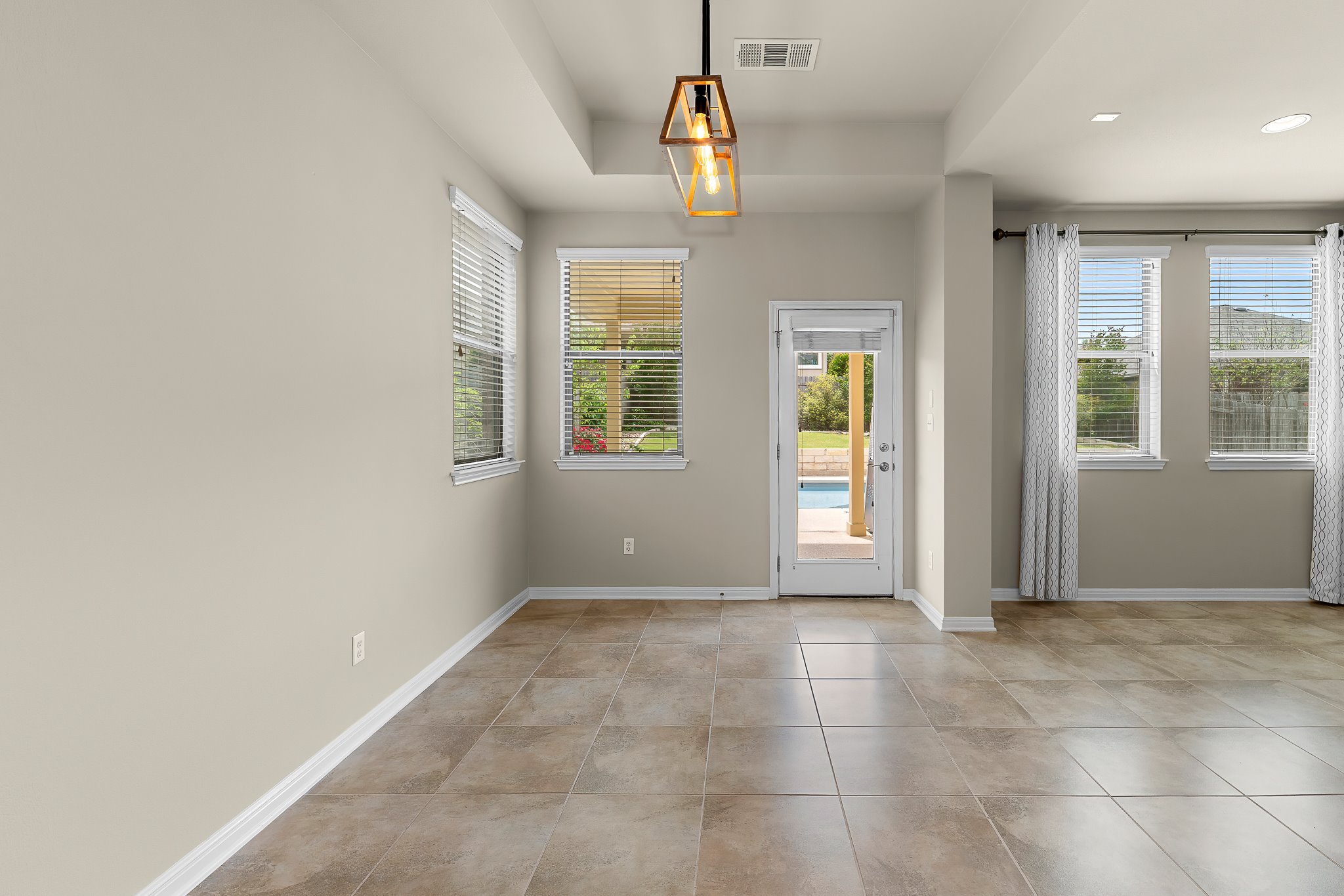 2813 Granite Hill Cove Leander, TX 78641 - Photo 16 of 39 Dining space featuring a ceiling fan & recessed lighting - freshly painted