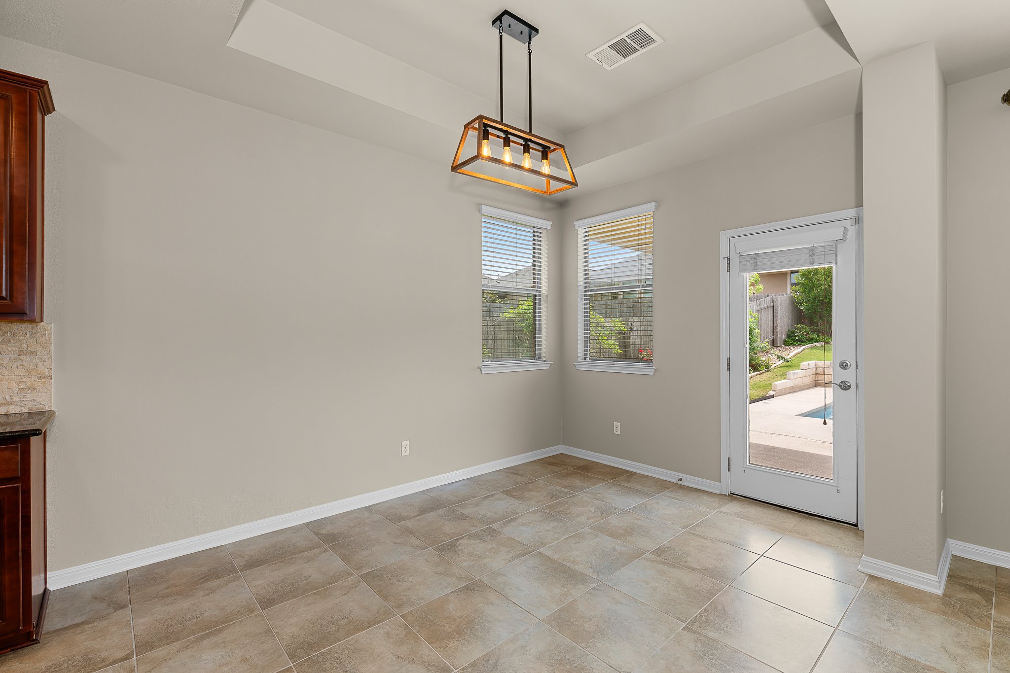 2813 Granite Hill Cove Leander, TX 78641 - Photo 17 of 39 Dining space featuring a ceiling fan & recessed lighting - freshly painted