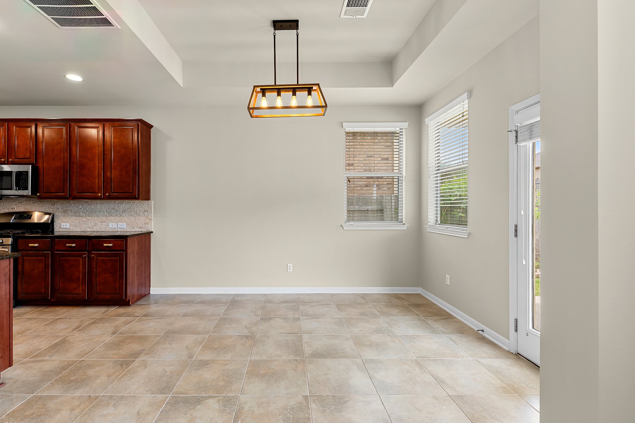 2813 Granite Hill Cove Leander, TX 78641 - Photo 18 of 39 Dining space featuring a ceiling fan & recessed lighting - freshly painted