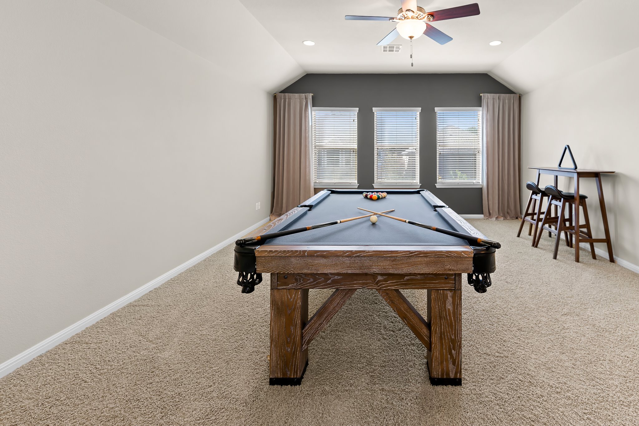 2813 Granite Hill Cove Leander, TX 78641 - Photo 25 of 39 Playroom with light colored carpet, vaulted ceiling, recessed lighting, and ceiling fan
