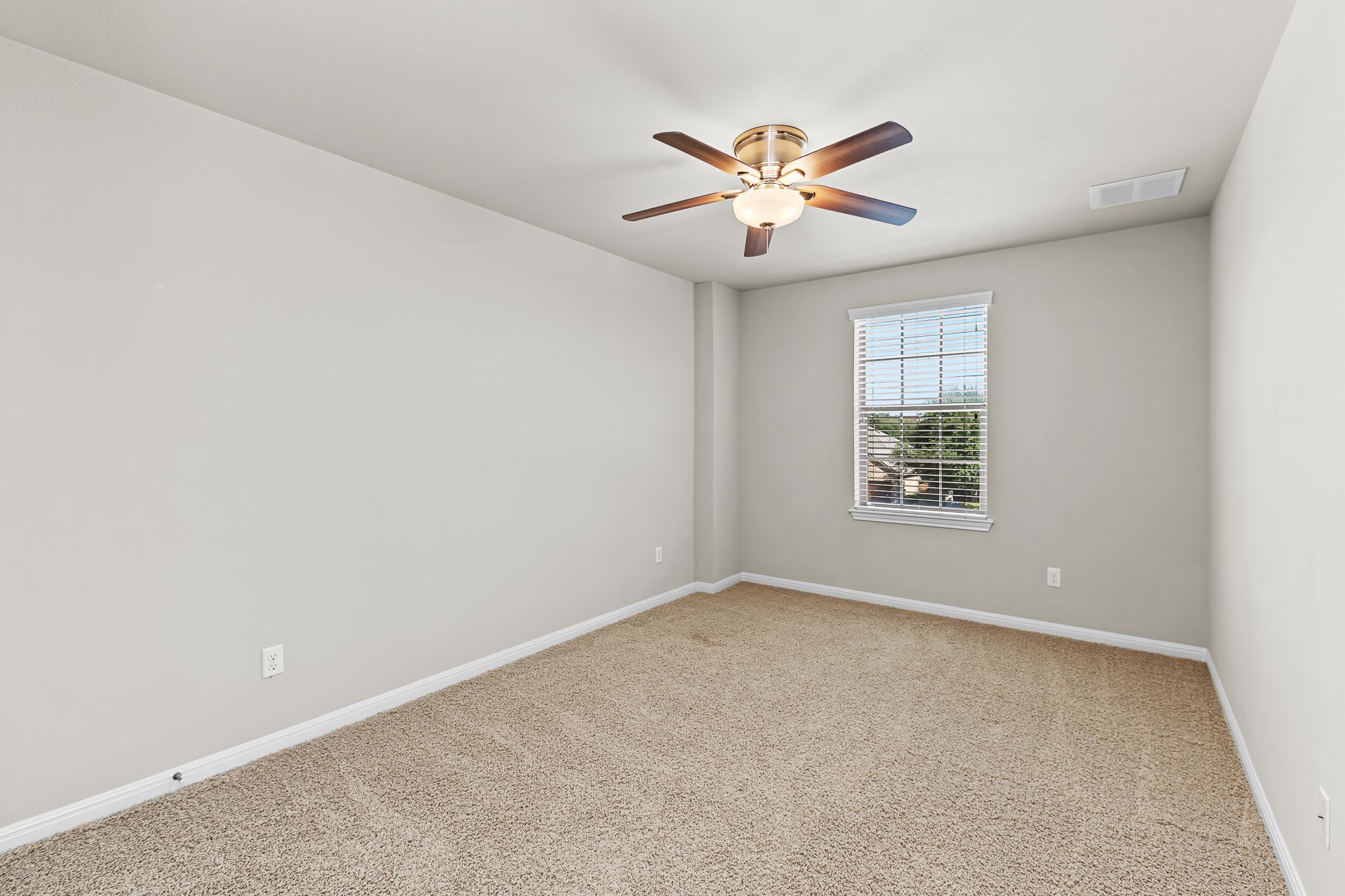 2813 Granite Hill Cove Leander, TX 78641 - Photo 28 of 35 Bedroom with carpet and ceiling fan