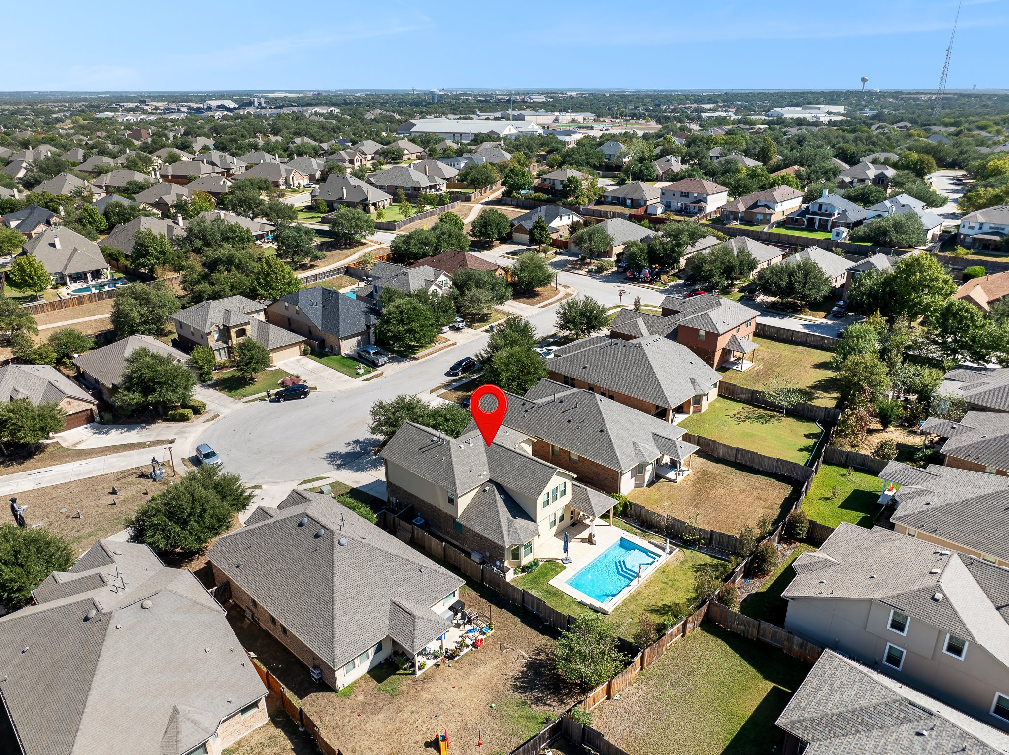 2813 Granite Hill Cove Leander, TX 78641 - Photo 35 of 39 Aerial view of residential area featuring a pool