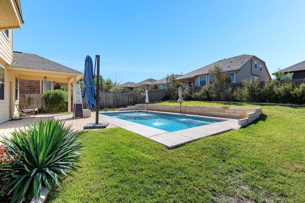 2813 Granite Hill Cove Leander, TX 78641 - Photo 5 of 35 a view of a house with a swimming pool
