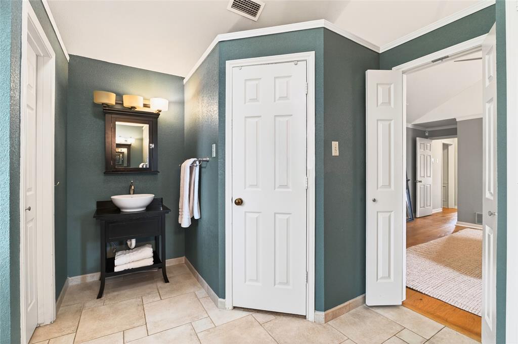 819 Lockhaven Lane Coppell, TX 75019 - Photo 22 of 33 Dual vanities with plenty of counter space and storage where you actually need it.
