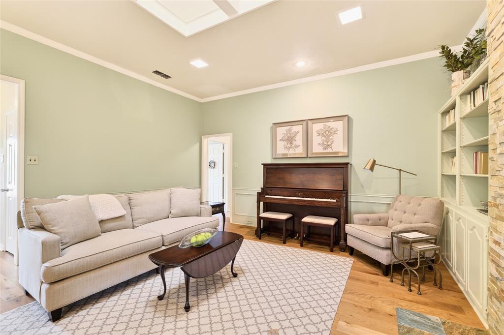 819 Lockhaven Lane Coppell, TX 75019 - Photo 7 of 33 Original paneling, softened with paint, shifts the feel of the space without losing what made it work in the first place.