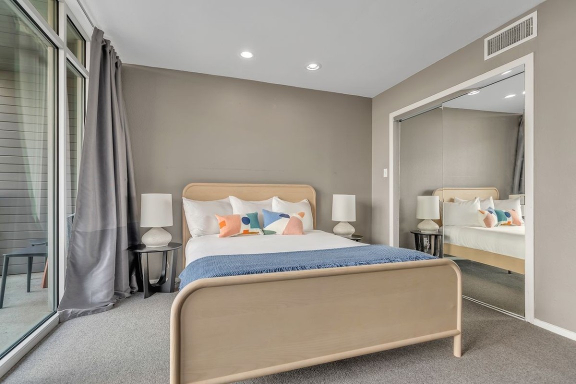 119 East 6th Street, Unit 702 Austin, TX 78701 - Photo 11 of 11 Carpeted bedroom featuring recessed lighting and a closet