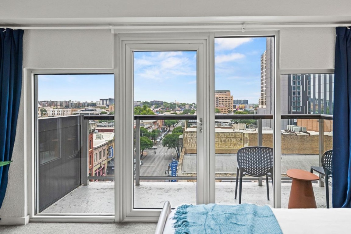 119 East 6th Street, Unit 702 Austin, TX 78701 - Photo 5 of 11 Entryway featuring a city view and plenty of natural light