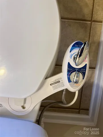 a bathroom with a toilet and a sink