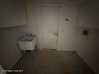 a kitchen with cabinets stainless steel appliances and a counter top