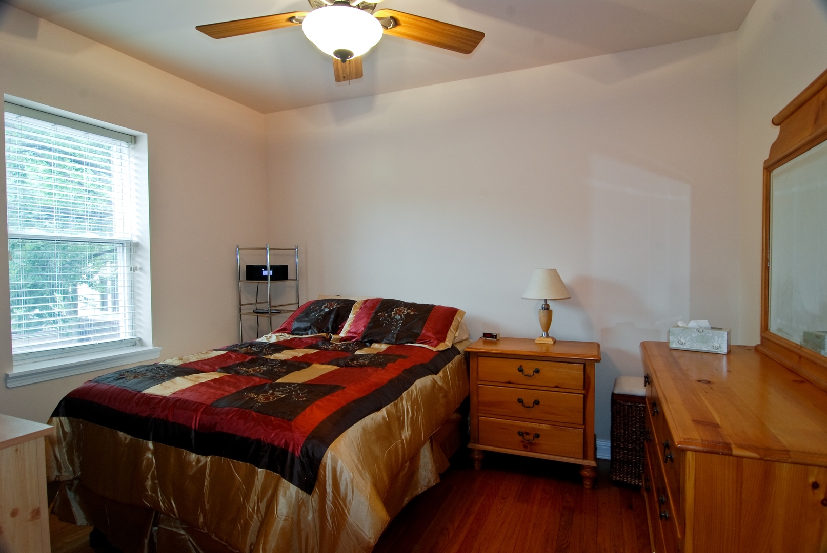 56 Forest Avenue, Unit 1N Riverside, IL 60546 - Photo 14 of 21 a bedroom with a bed and a tv