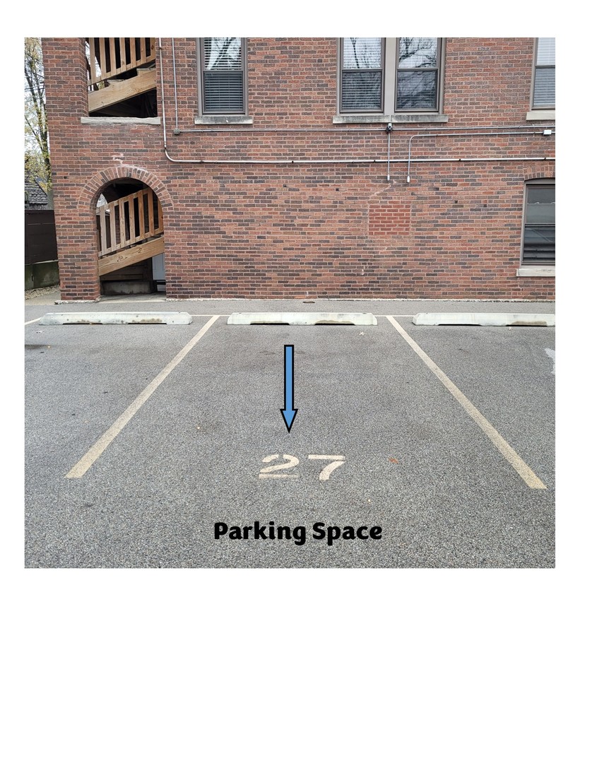 56 Forest Avenue, Unit 1N Riverside, IL 60546 - Photo 16 of 21 a black and white photo of a street