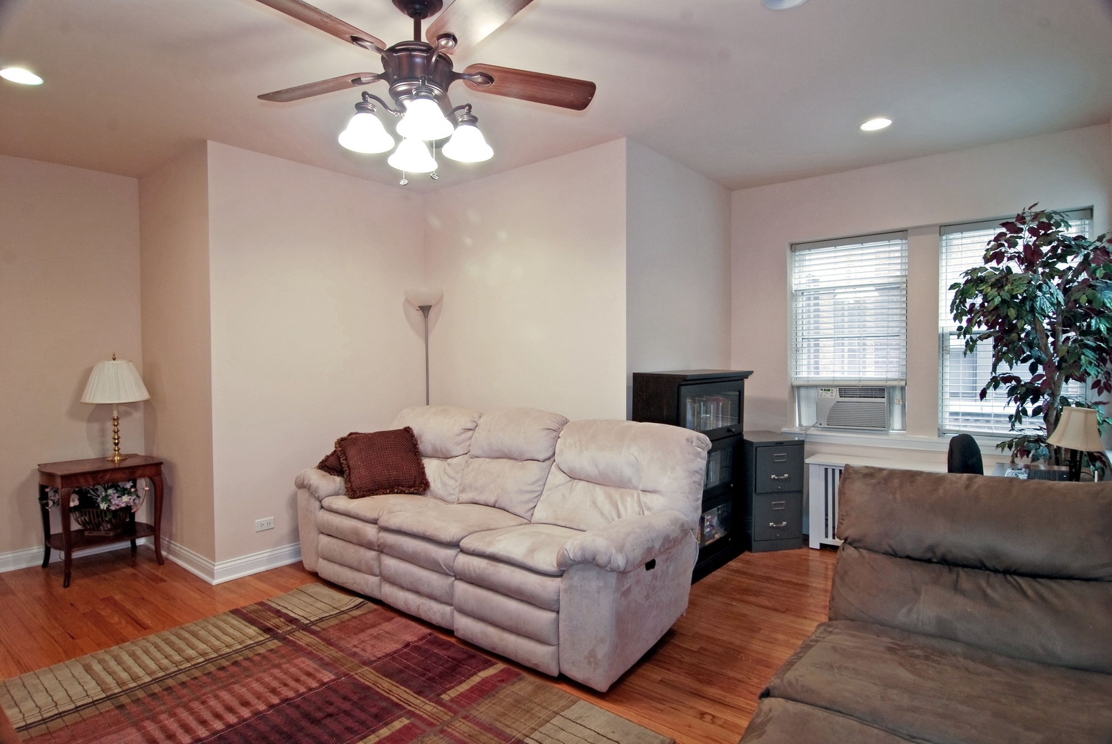 56 Forest Avenue, Unit 1N Riverside, IL 60546 - Photo 4 of 21 a living room with furniture and a chandelier