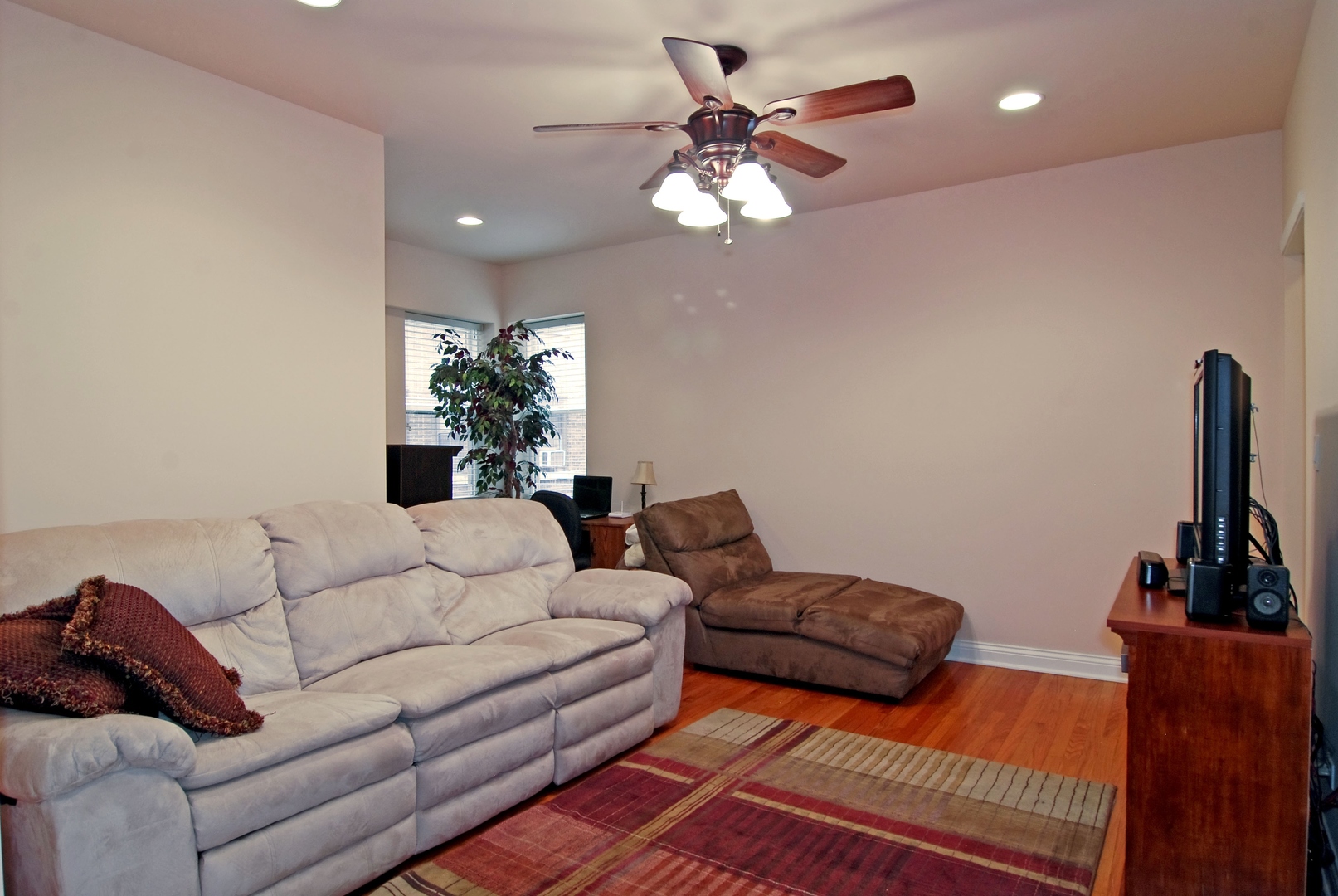 56 Forest Avenue, Unit 1N Riverside, IL 60546 - Photo 7 of 21 a living room with furniture a chandelier and a mirror