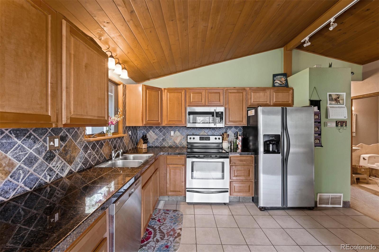 7957 South Brook Forest Road Evergreen, CO 80439 - Photo 8 of 39 Gallery Image 8
