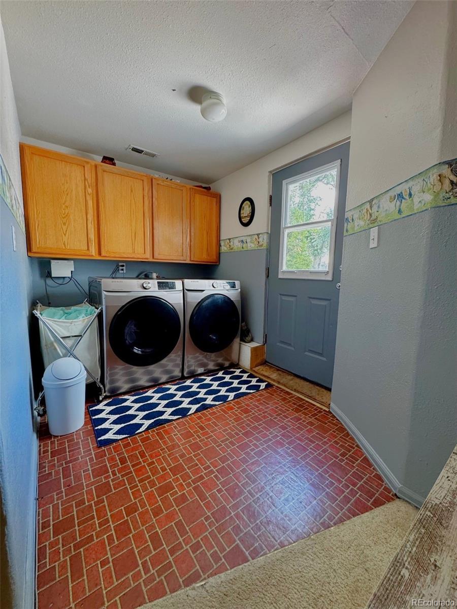 329 6th Street Hugo, CO 80821 - Photo 38 of 50 a bedroom with a bed and a window