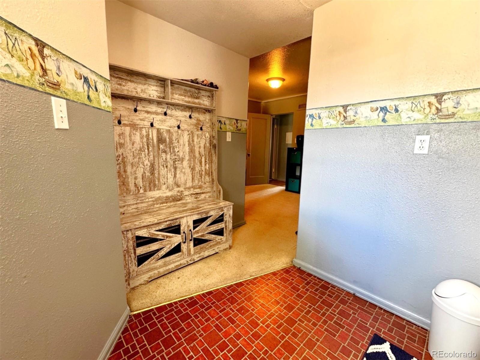 329 6th Street Hugo, CO 80821 - Photo 39 of 50 a bathroom with a shower
