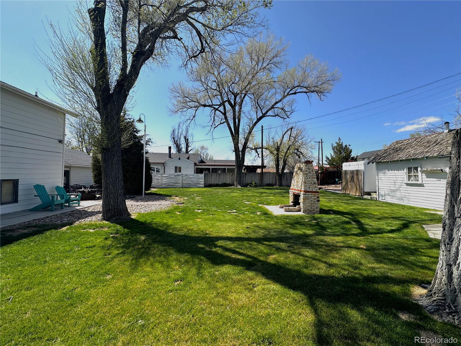 329 6th Street Hugo, CO 80821 - Photo 44 of 50 a garden view with a fountain