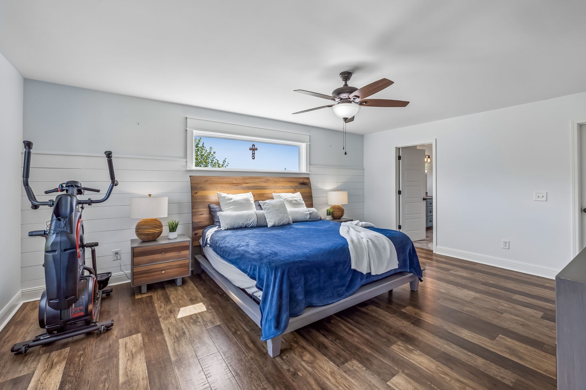 86 Ben Road Westmoreland, TN 37186 - Photo 33 of 64 a bedroom with a bed and a chandelier