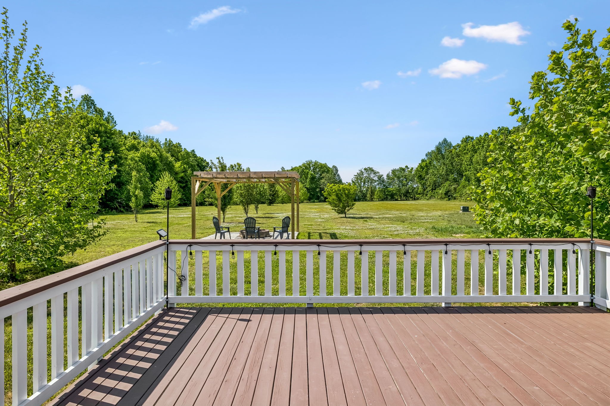 86 Ben Road Westmoreland, TN 37186 - Photo 40 of 64 a view of a wooden roof deck
