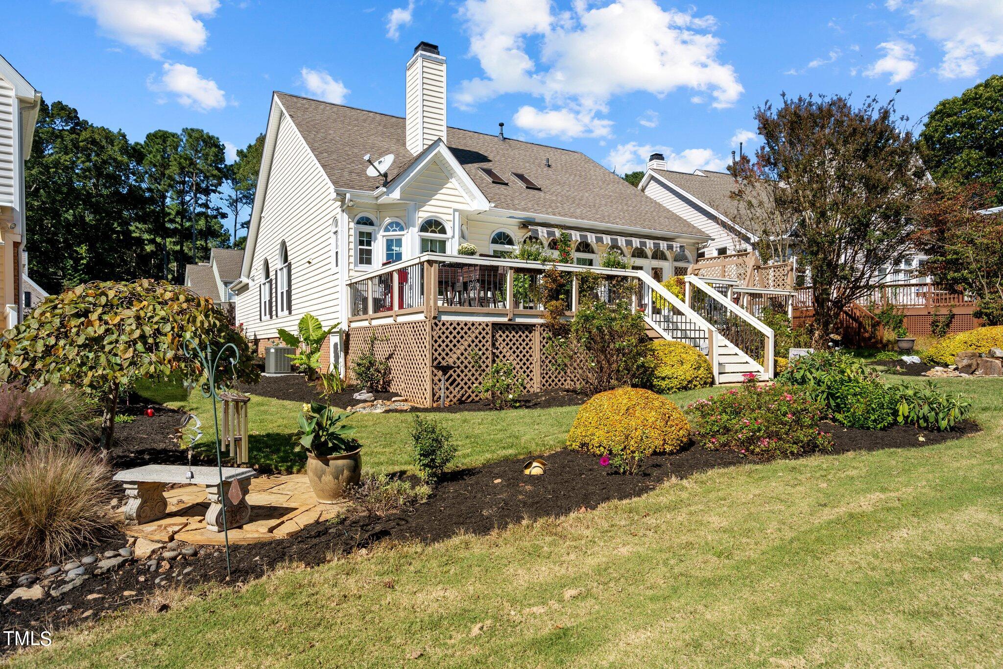 10125 Goodview Court Raleigh, NC 27613 - Photo 37 of 45 a front view of a house with a yard and lake view