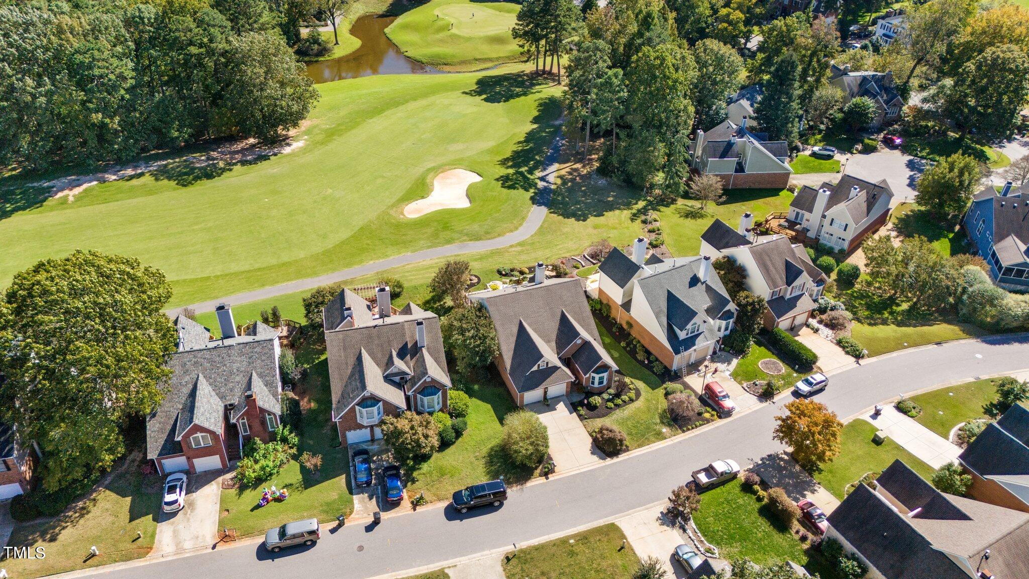 10125 Goodview Court Raleigh, NC 27613 - Photo 39 of 45 an aerial view of residential houses with outdoor space and parking