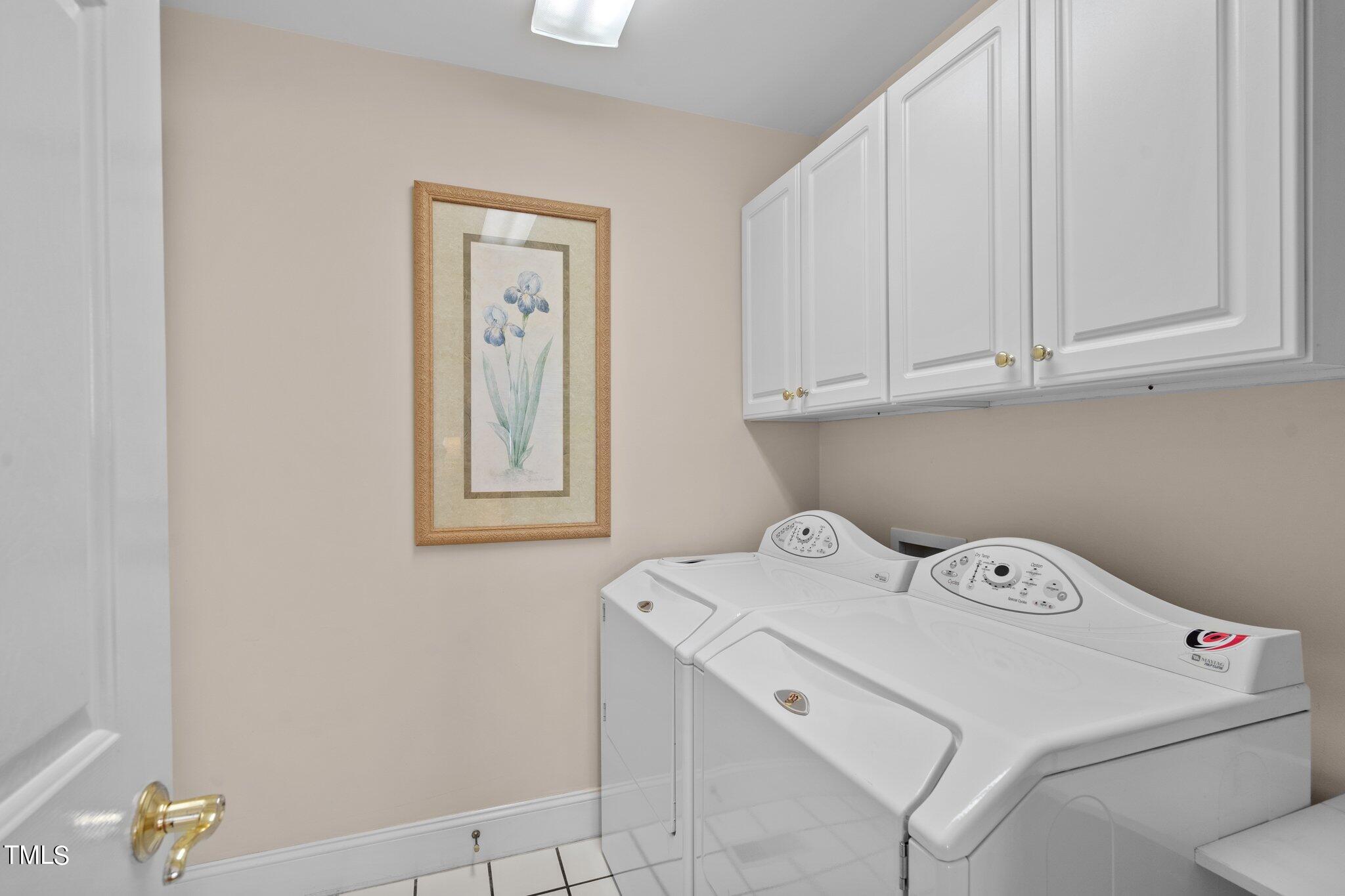 10125 Goodview Court Raleigh, NC 27613 - Photo 8 of 45 a utility room with dryer and washer