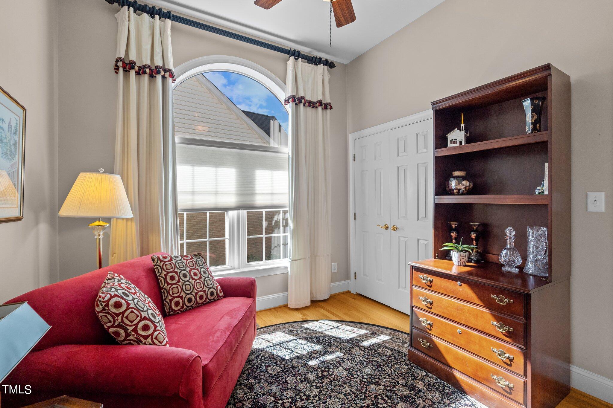 10125 Goodview Court Raleigh, NC 27613 - Photo 9 of 45 a bedroom with furniture and a window